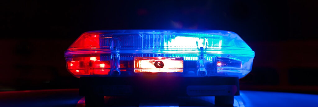 Lights on a police cruiser at night