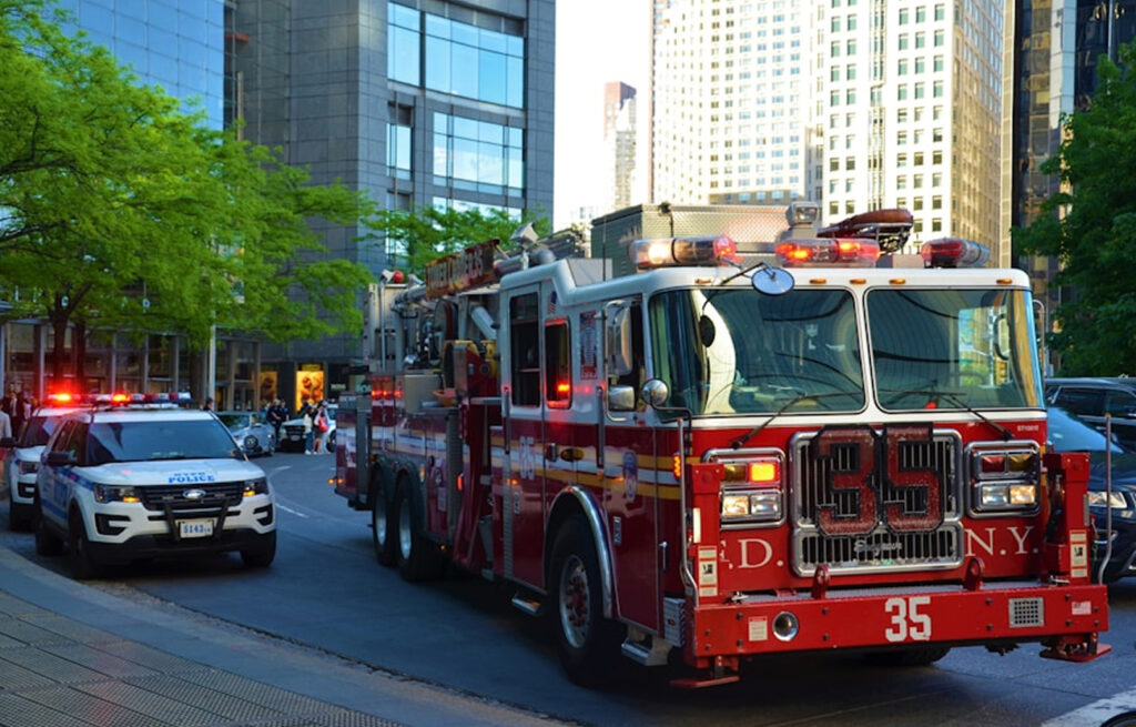 Firetruck and Police vehicle on the road